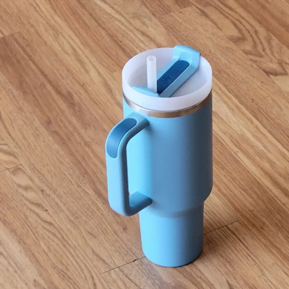 Stanley Quencher H2.0 FlowState Tumbler 40 oz Light Blue Teal with Handle Straw
